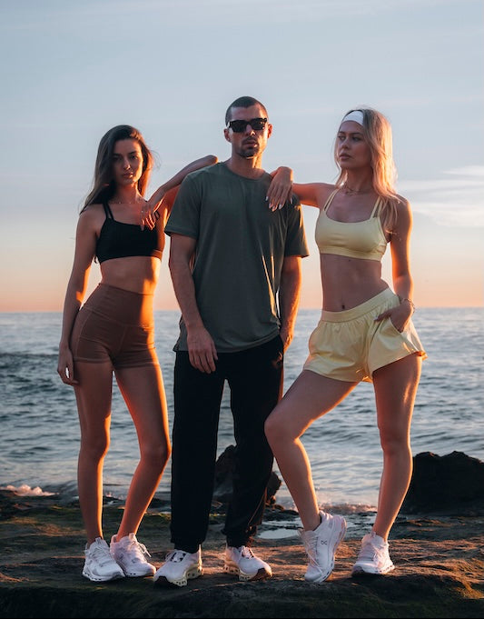 (Left) skyline bra, monte vista body short, (middle) forest all day tee, fairview training day performance pant, (right) Skyline bra, canyon everyday run short